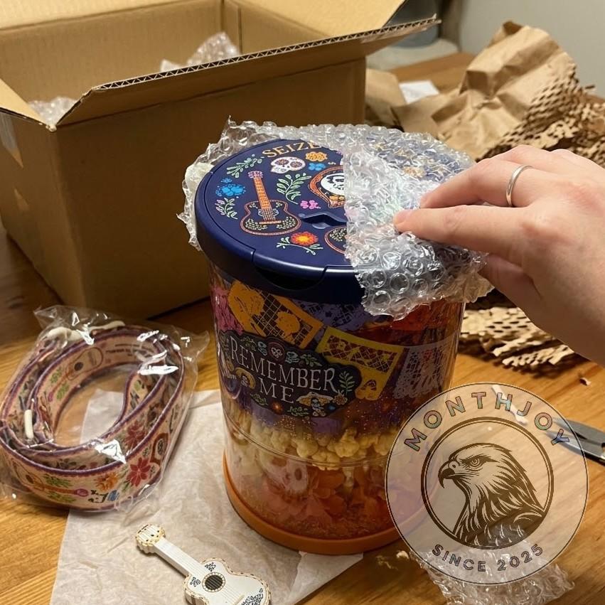 Disney Pixar Coco Remember Me Light Up Popcorn Bucket - close-up of lid and upper design