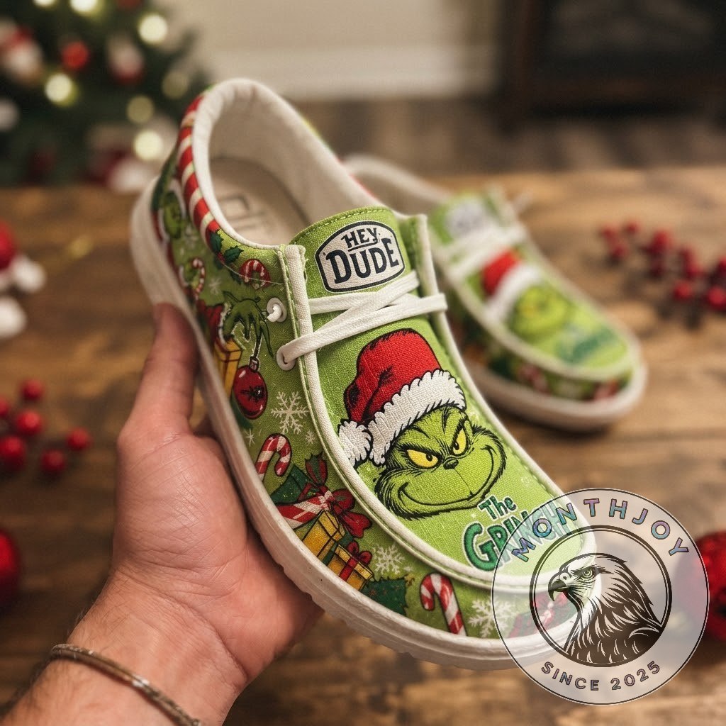 The Grinch Christmas Mischief Loafer Shoes - side view showing candy canes, presents, and ornaments